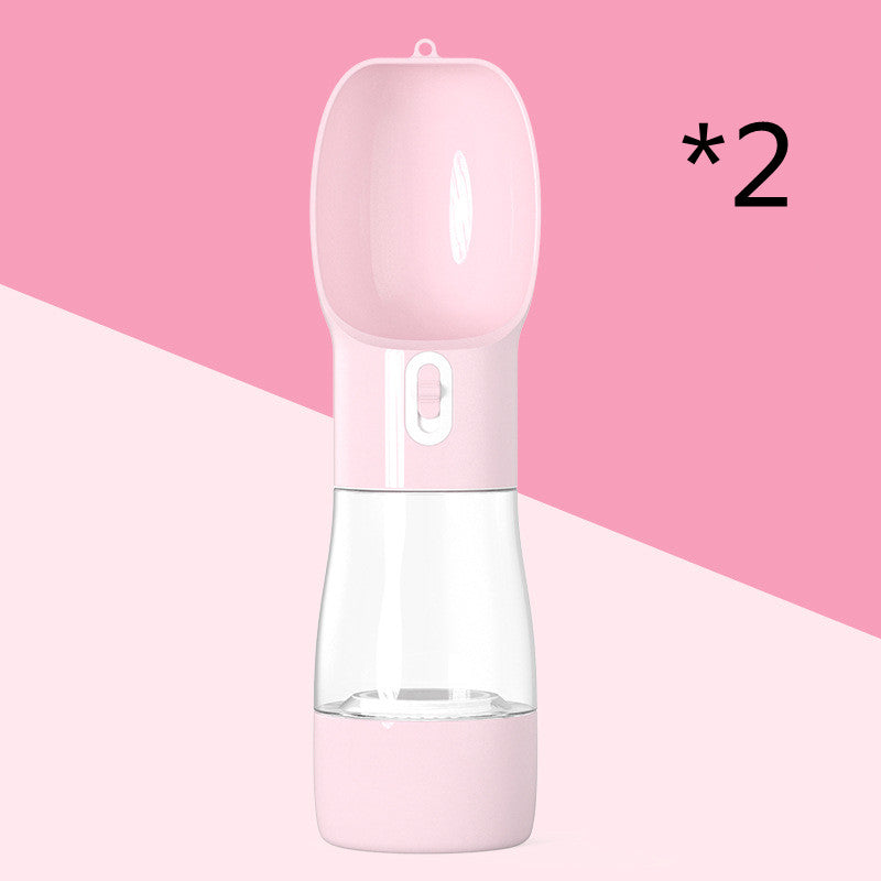 Pink 2-in-1 dog water and food bottle with drinking cap and base