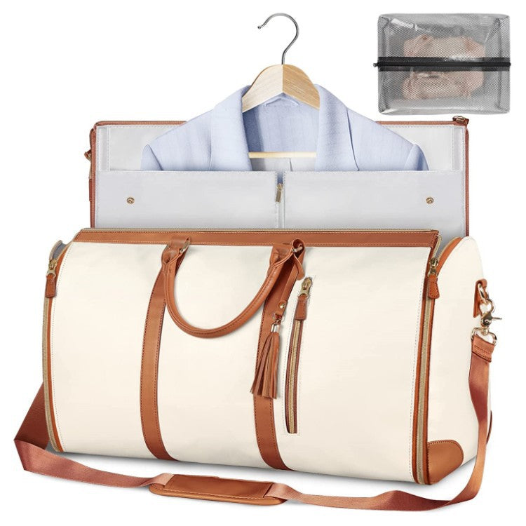 Foldable white waterproof duffel bag with brown trim, open interior, shoulder strap