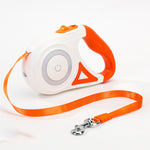 Retractable dog leash set, orange and white case with orange strap and metal hook
