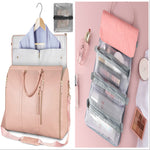 Pink waterproof travel duffel bag with open clothing organizer and clear mesh pocket