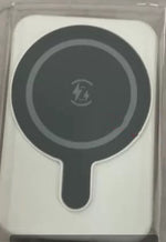 Wireless power bank charging pad with MagSafe-style circular contact on a light back