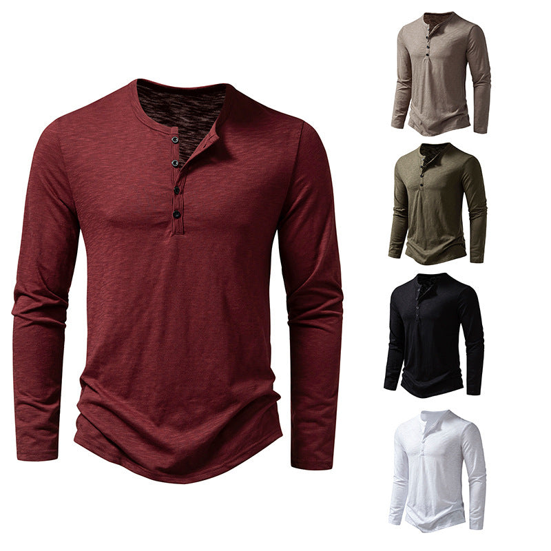 Men's long sleeve henley pullover in wine red with button placket and curved hem