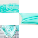 Silicone grooming brush glove with raised nubs on palm, teal
