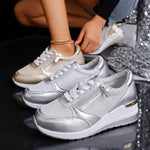 Women's silver lace-up sneakers with side zip, thick sole and white laces