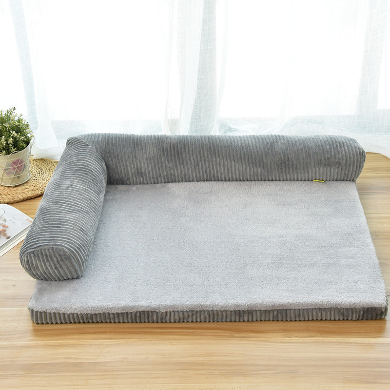 Gray pet dog bed with ribbed bolster and light gray plush mat