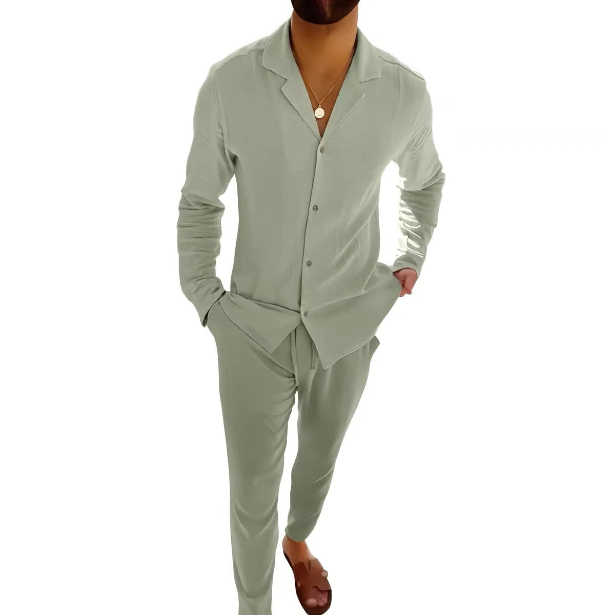 Light green long-sleeve lapel shirt and slim trousers set, front buttons and tapered legs.