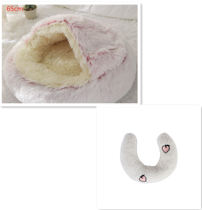Half-moon plush bolster with light gray fabric and small face/heart patches