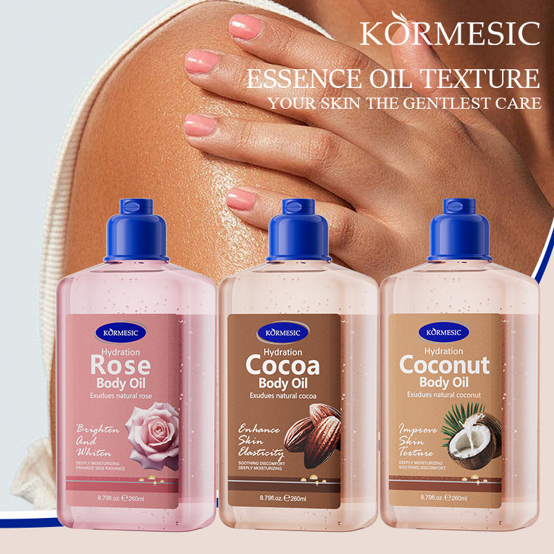 KORMESIC cocoa body oil bottle among three body oil bottles with blue caps