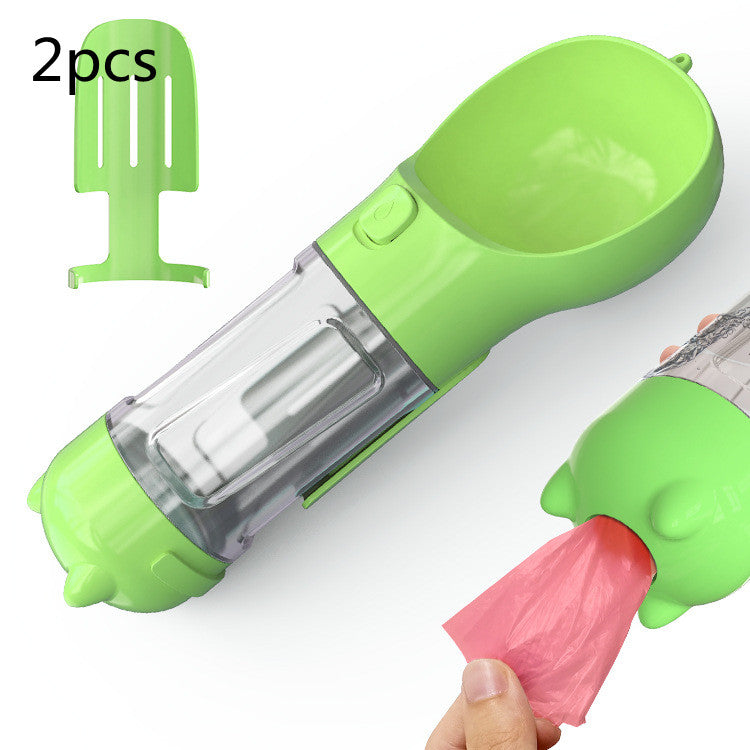 Lime green portable pet water bottle feeder with transparent tube and attached pink waste bag