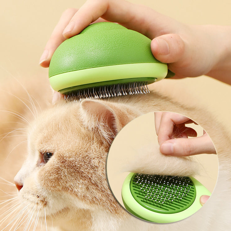 Avocado-shaped pet brush and grooming comb, green handle with metal bristles