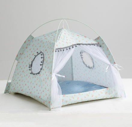 Enclosed cat tent bed, light aqua fabric with penguin motifs and sheer mesh sides