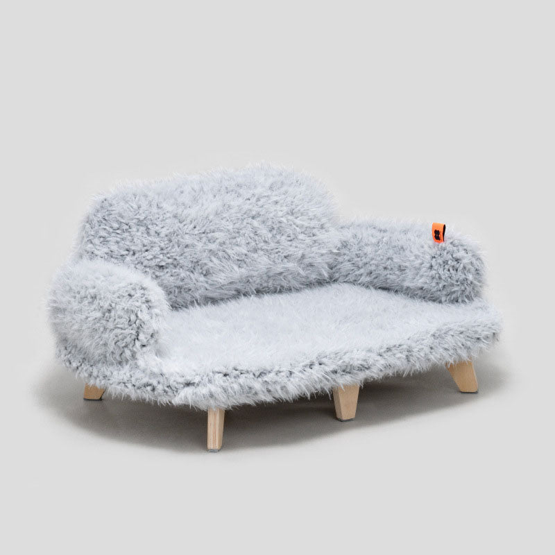 Gray-and-white shag luxury wooden pet bed with rounded frame and four wooden legs