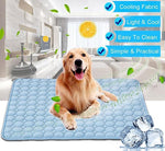 Blue ice silk cooling pad with pebble pattern; golden dog resting on top
