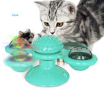 Cat rotating windmill toy with turquoise base, spiky center, and three clear rotating bowls