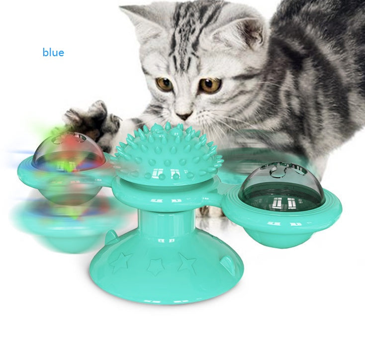 Cat rotating windmill toy with turquoise base, spiky center, and three clear rotating bowls