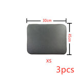 Cat litter mat, textured dark fabric, rounded rectangle with stitched edges