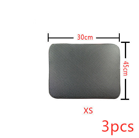 Cat litter mat, textured dark fabric, rounded rectangle with stitched edges