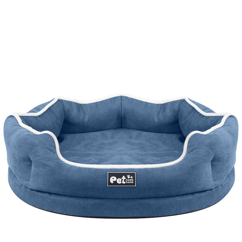Blue round removable pet bed mattress with white piping and logo patch, centered