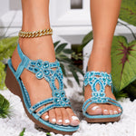 Blue jeweled wedge sandals with elastic ankle strap, open toe