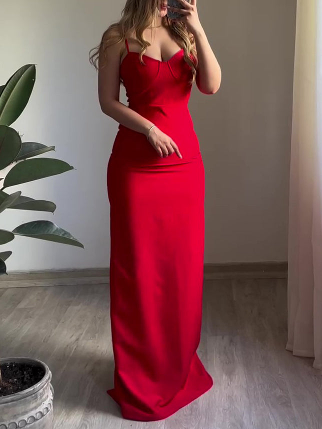 Red satin maxi slip dress with spaghetti straps, straight back, and front slit.