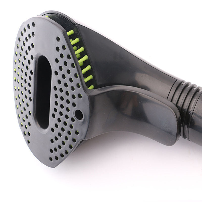 Pet grooming brush head with perforations and green bristles on dark handle