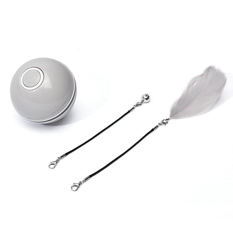 Gray LED rolling cat toy ball with black tether straps and gray feather