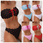 Black printed tube-top bikini with red hearts, scalloped edges, tie-front drawstring high-waist briefs