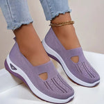 Women's mesh slip-on flats in lavender, cutout toe and white sole.