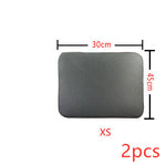 Cat litter mat, textured dark fabric, rounded rectangle top view
