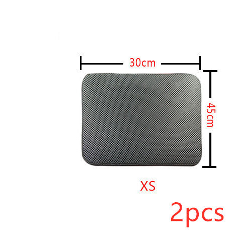 Cat litter mat, textured dark fabric, rounded rectangle top view