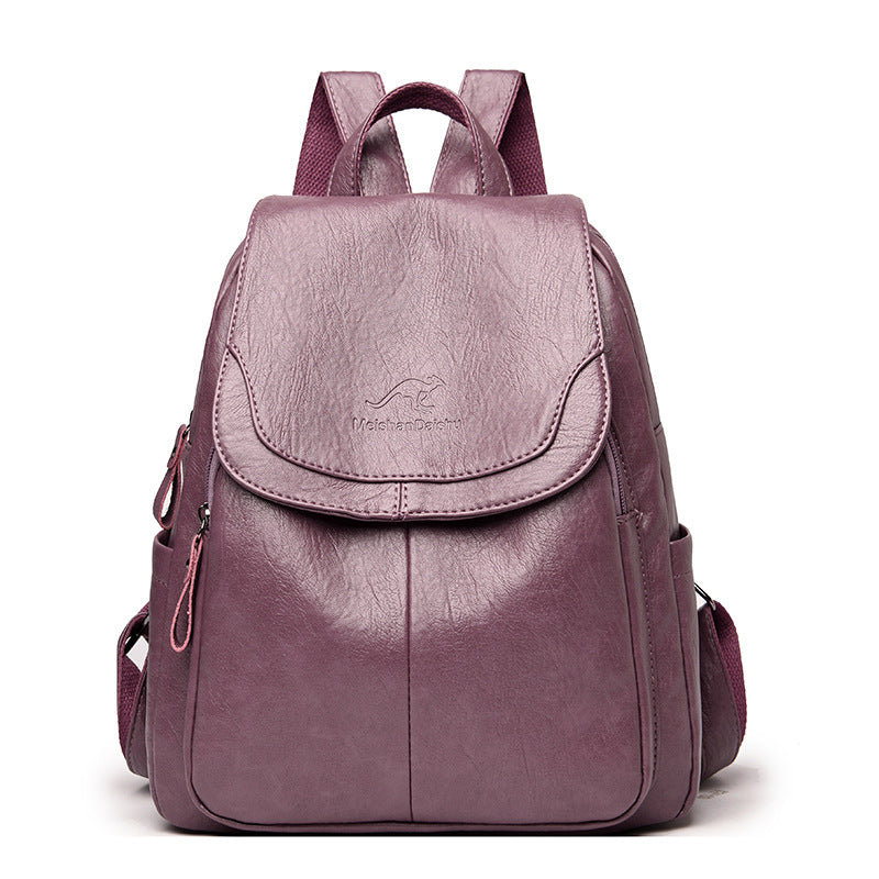 Women's PU leather travel backpack with front flap and side zippers, wine red