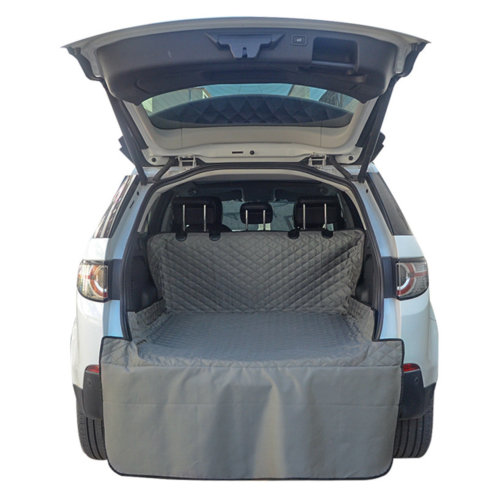 Grey waterproof pet trunk mat covering cargo area with quilted back panel
