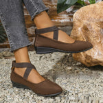 Women’s pointed toe cross-strap wedge flats in brown suede with elastic band at ankle