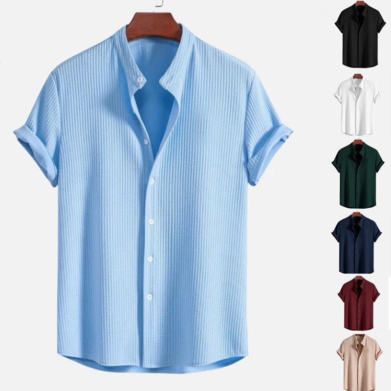 Light blue short sleeve button-up shirt with pointed collar and relaxed fit