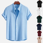 Light blue short sleeve button-up shirt with pointed collar and relaxed fit