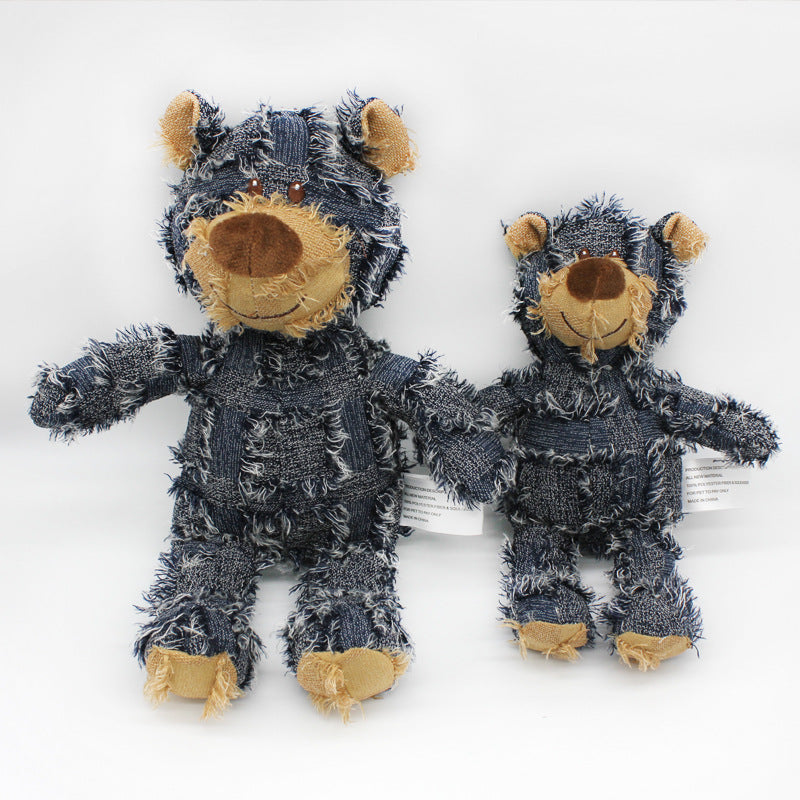 Bear-shaped dog plush toy, navy blue with tan muzzle and paws