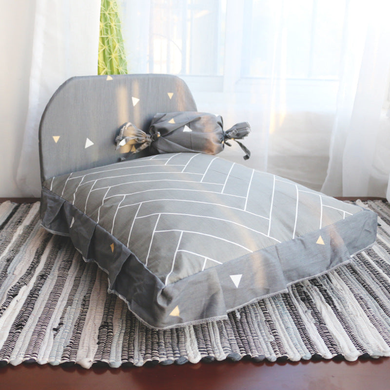 Small teddy dog pet bed with gray fabric and white geometric line pattern