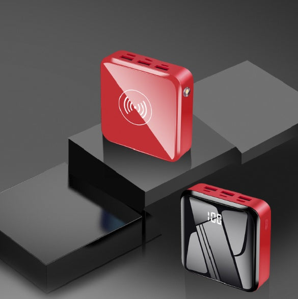 Red mini power bank with wireless charging icon and side charging ports