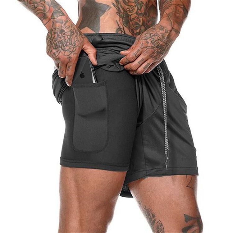 Black compression sports shorts with side zip pocket and drawstring