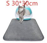 Waterproof cat litter pad, gray honeycomb texture with cat on a blue litter box