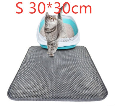 Waterproof cat litter pad, gray honeycomb texture with cat on a blue litter box