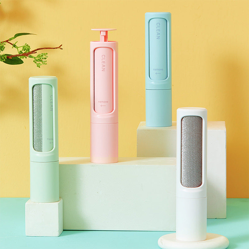 Reusable pet hair remover lint roller brush set with gray, pink, and blue bodies