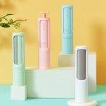 Reusable pet hair remover lint roller brush set with gray, pink, and blue bodies
