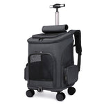Dark grey pet carrier trolley backpack with mesh panels, side storage pouch, and rolling wheels.