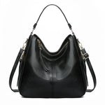 Black hobo bucket bag with zipper top and adjustable shoulder strap