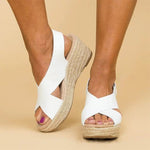 Open-toe wedge sandals with wide crossover straps, white PU and tan espadrille platform