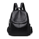 Women's PU leather travel backpack with front flap and adjustable straps, black
