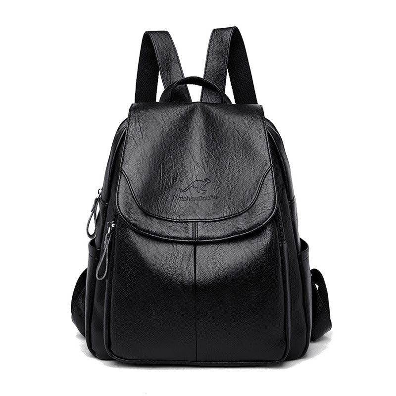 Women's PU leather travel backpack with front flap and adjustable straps, black