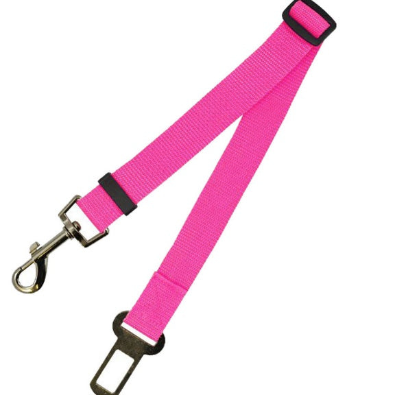 Adjustable dog car seat belt strap in bright pink with metal clasp and buckle adjuster.