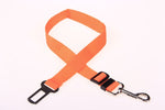 Orange adjustable dog car seat belt strap with black buckle and metal clip